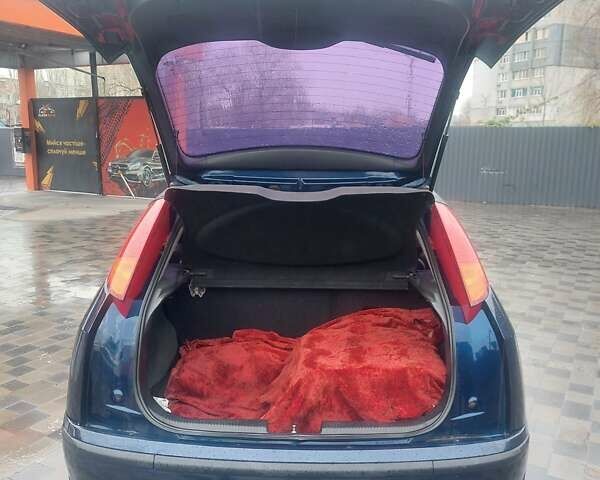 Синий Форд Фокус, объемом двигателя 1.4 л и пробегом 268 тыс. км за 3600 $, фото 3 на Automoto.ua