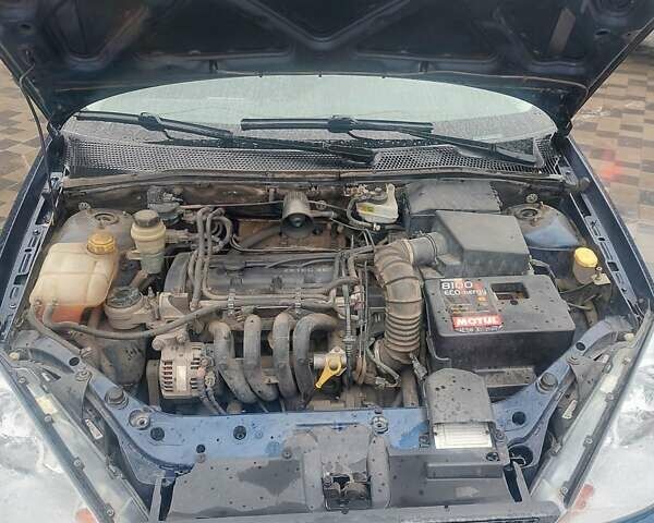 Синий Форд Фокус, объемом двигателя 1.4 л и пробегом 268 тыс. км за 3600 $, фото 7 на Automoto.ua