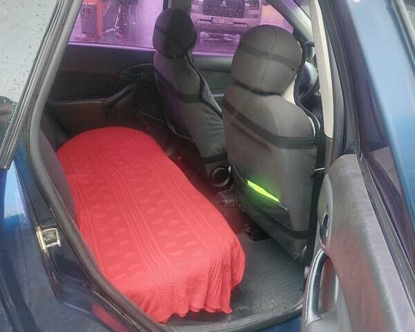 Синий Форд Фокус, объемом двигателя 1.4 л и пробегом 268 тыс. км за 3600 $, фото 6 на Automoto.ua