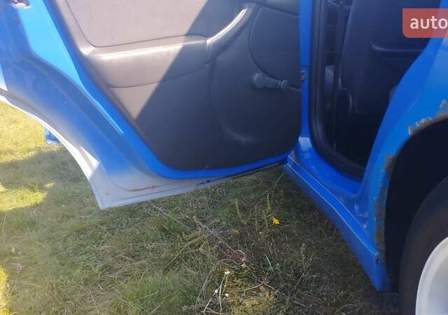 Синий Форд Фокус, объемом двигателя 1.6 л и пробегом 263 тыс. км за 3150 $, фото 4 на Automoto.ua