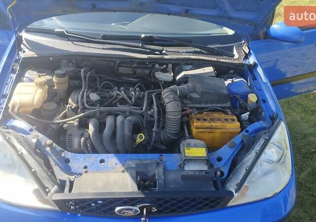 Синій Форд Фокус, об'ємом двигуна 1.6 л та пробігом 263 тис. км за 3150 $, фото 11 на Automoto.ua