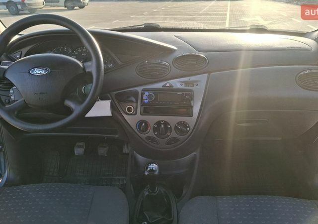 Синий Форд Фокус, объемом двигателя 1.4 л и пробегом 155 тыс. км за 3600 $, фото 5 на Automoto.ua