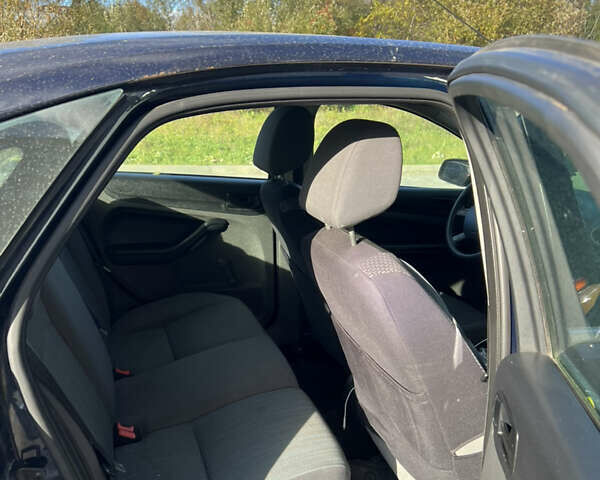 Синий Форд Фокус, объемом двигателя 1.4 л и пробегом 240 тыс. км за 3800 $, фото 4 на Automoto.ua