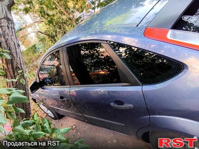 Синий Форд Фокус, объемом двигателя 1.4 л и пробегом 260 тыс. км за 4000 $, фото 1 на Automoto.ua