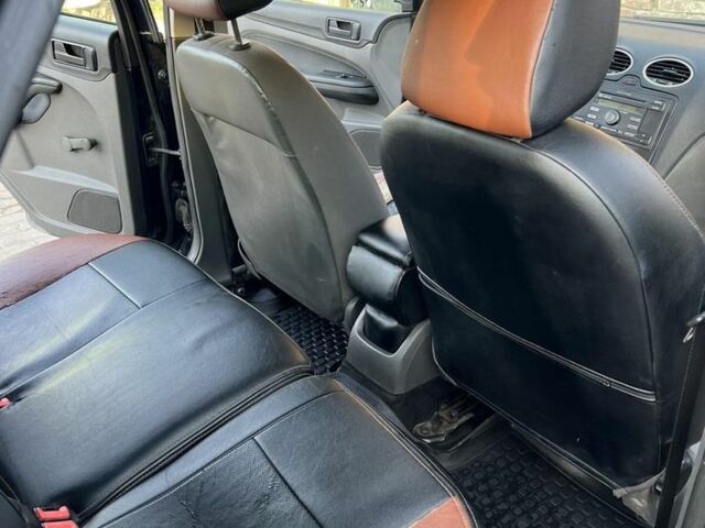 Синій Форд Фокус, об'ємом двигуна 1.4 л та пробігом 240 тис. км за 4100 $, фото 10 на Automoto.ua