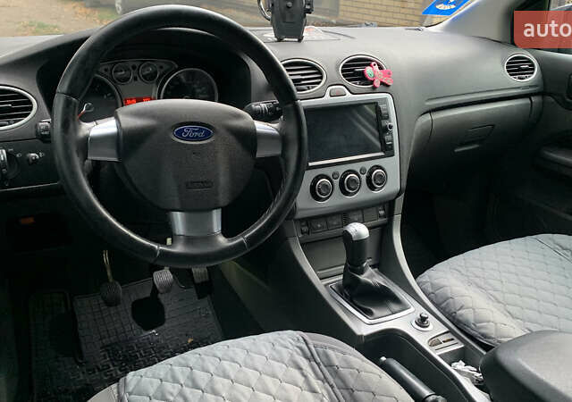 Синий Форд Фокус, объемом двигателя 1.6 л и пробегом 182 тыс. км за 5100 $, фото 7 на Automoto.ua