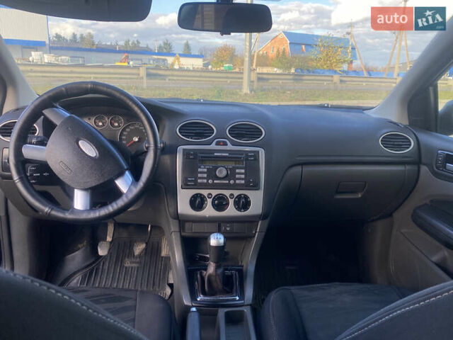 Синий Форд Фокус, объемом двигателя 1.39 л и пробегом 321 тыс. км за 3100 $, фото 11 на Automoto.ua