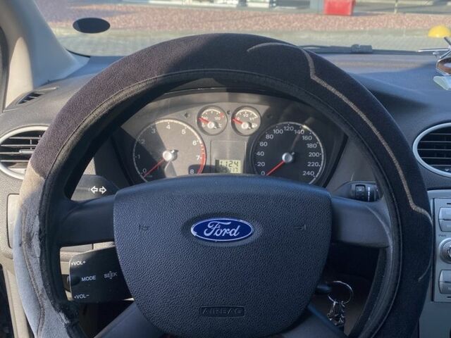 Синій Форд Фокус, об'ємом двигуна 1.4 л та пробігом 325 тис. км за 3800 $, фото 7 на Automoto.ua