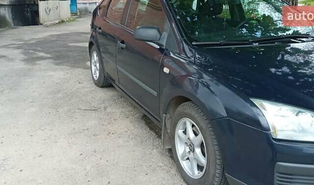 Синій Форд Фокус, об'ємом двигуна 1.4 л та пробігом 224 тис. км за 5250 $, фото 14 на Automoto.ua