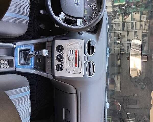 Синий Форд Фокус, объемом двигателя 1.8 л и пробегом 300 тыс. км за 4000 $, фото 18 на Automoto.ua
