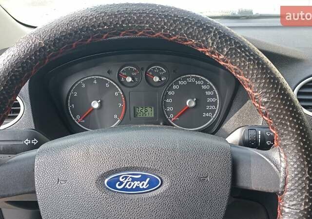 Синий Форд Фокус, объемом двигателя 1.4 л и пробегом 203 тыс. км за 3600 $, фото 8 на Automoto.ua