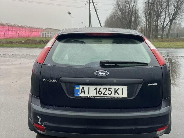 Синий Форд Фокус, объемом двигателя 1.4 л и пробегом 300 тыс. км за 3300 $, фото 4 на Automoto.ua