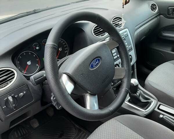 Синий Форд Фокус, объемом двигателя 1.6 л и пробегом 265 тыс. км за 4400 $, фото 37 на Automoto.ua