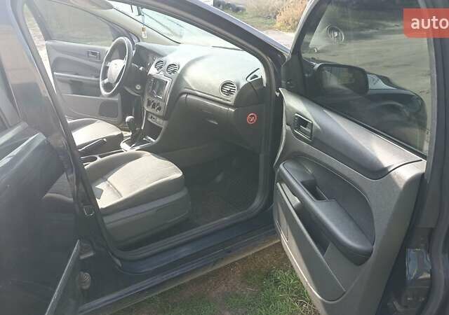 Синий Форд Фокус, объемом двигателя 1.4 л и пробегом 203 тыс. км за 3600 $, фото 7 на Automoto.ua