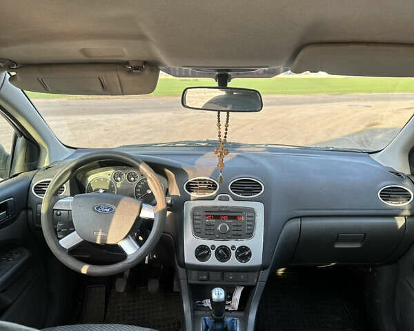 Синій Форд Фокус, об'ємом двигуна 1.4 л та пробігом 305 тис. км за 2999 $, фото 4 на Automoto.ua