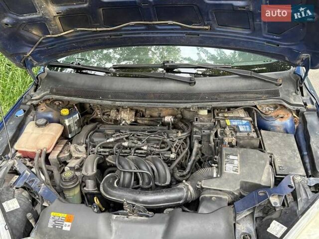 Синий Форд Фокус, объемом двигателя 1.6 л и пробегом 312 тыс. км за 5450 $, фото 17 на Automoto.ua