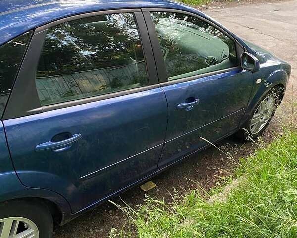 Синий Форд Фокус, объемом двигателя 1.6 л и пробегом 312 тыс. км за 5450 $, фото 3 на Automoto.ua