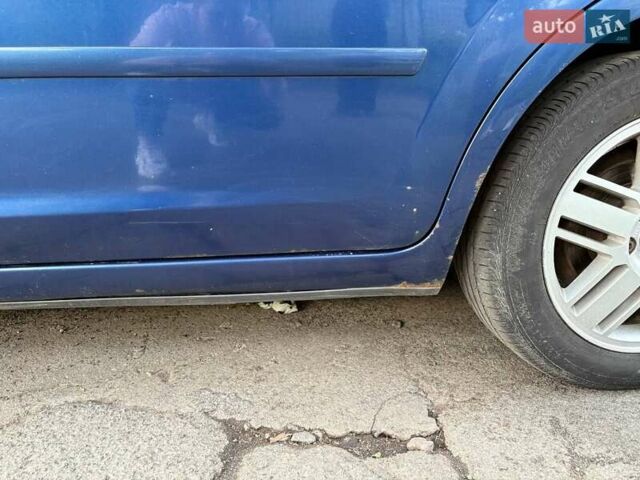 Синий Форд Фокус, объемом двигателя 1.6 л и пробегом 312 тыс. км за 5450 $, фото 12 на Automoto.ua