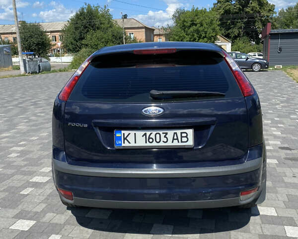 Синий Форд Фокус, объемом двигателя 1.4 л и пробегом 243 тыс. км за 4199 $, фото 3 на Automoto.ua