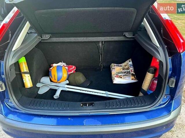 Синій Форд Фокус, об'ємом двигуна 1.8 л та пробігом 238 тис. км за 5999 $, фото 7 на Automoto.ua