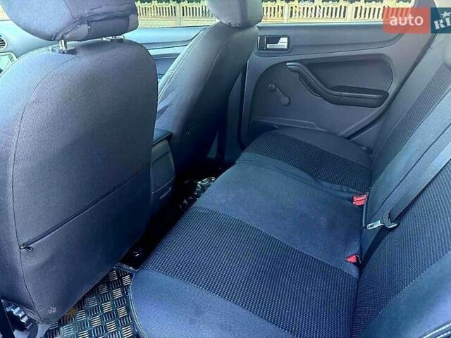 Синій Форд Фокус, об'ємом двигуна 1.8 л та пробігом 238 тис. км за 5999 $, фото 11 на Automoto.ua