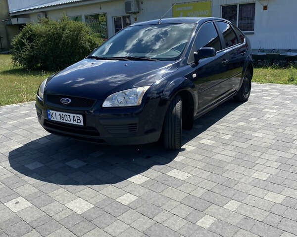 Синий Форд Фокус, объемом двигателя 1.4 л и пробегом 243 тыс. км за 4199 $, фото 4 на Automoto.ua