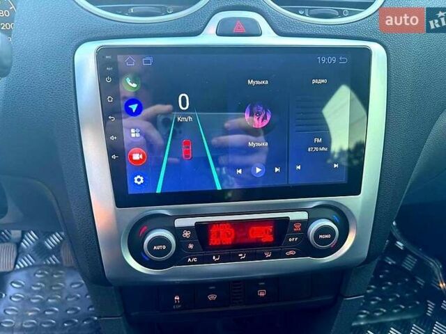 Синій Форд Фокус, об'ємом двигуна 1.8 л та пробігом 238 тис. км за 5999 $, фото 10 на Automoto.ua