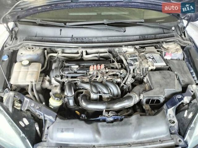 Синий Форд Фокус, объемом двигателя 1.6 л и пробегом 202 тыс. км за 4750 $, фото 13 на Automoto.ua