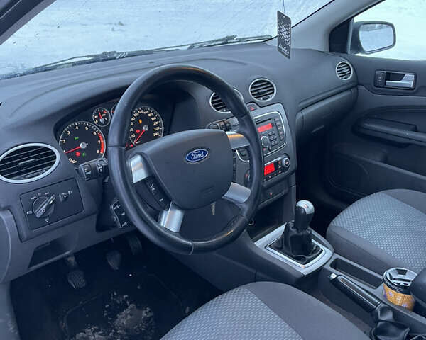 Синий Форд Фокус, объемом двигателя 1.6 л и пробегом 238 тыс. км за 5000 $, фото 6 на Automoto.ua