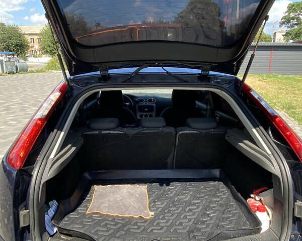 Синий Форд Фокус, объемом двигателя 1.4 л и пробегом 243 тыс. км за 4199 $, фото 8 на Automoto.ua