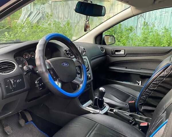 Синий Форд Фокус, объемом двигателя 1.6 л и пробегом 312 тыс. км за 5450 $, фото 4 на Automoto.ua