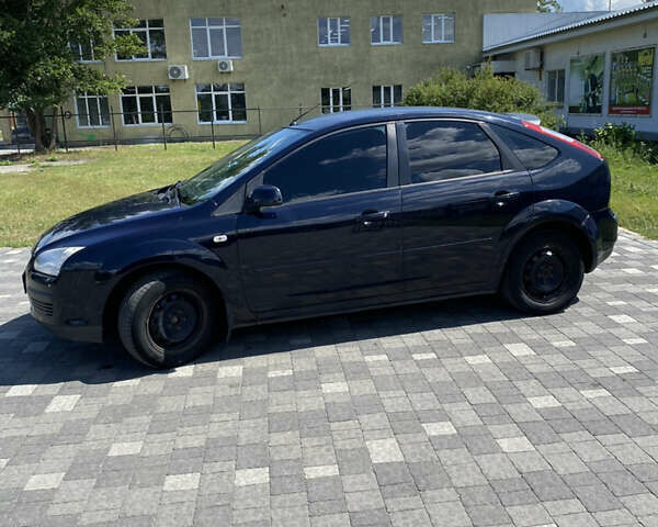 Синий Форд Фокус, объемом двигателя 1.4 л и пробегом 243 тыс. км за 4199 $, фото 2 на Automoto.ua