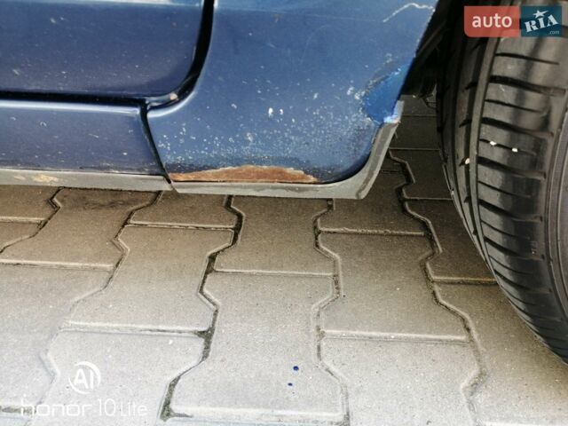 Синій Форд Фокус, об'ємом двигуна 1.4 л та пробігом 277 тис. км за 3700 $, фото 11 на Automoto.ua