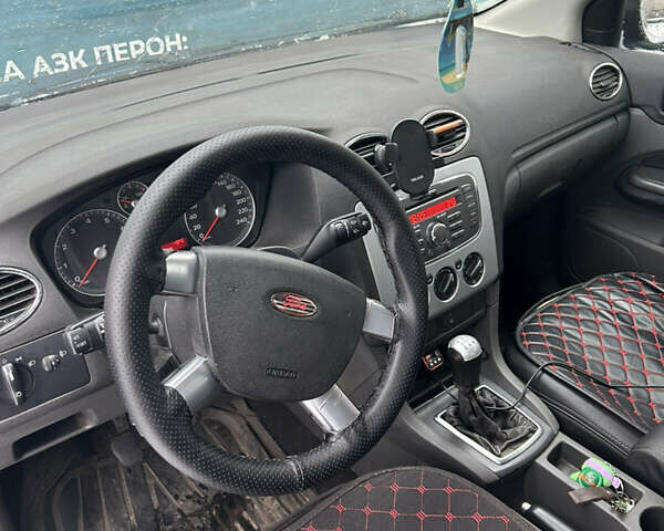Синий Форд Фокус, объемом двигателя 1.4 л и пробегом 174 тыс. км за 3950 $, фото 8 на Automoto.ua