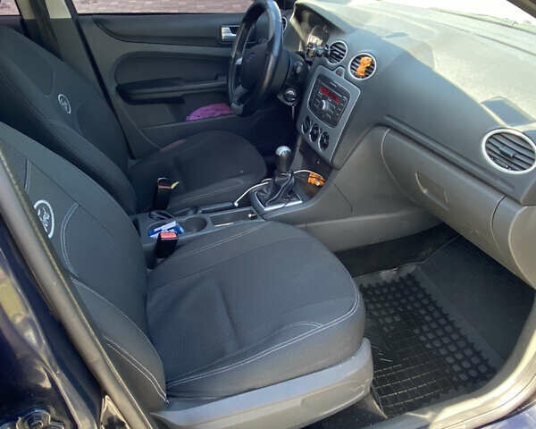 Синий Форд Фокус, объемом двигателя 1.4 л и пробегом 243 тыс. км за 4199 $, фото 10 на Automoto.ua