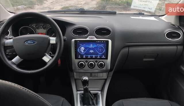 Синий Форд Фокус, объемом двигателя 1.6 л и пробегом 240 тыс. км за 5100 $, фото 14 на Automoto.ua