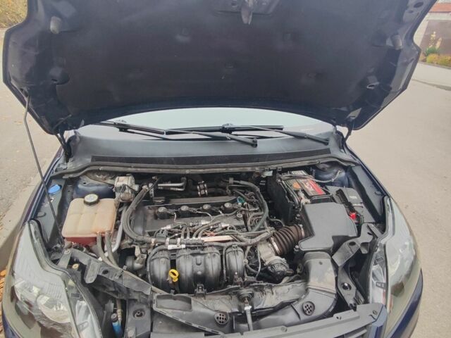 Синий Форд Фокус, объемом двигателя 2 л и пробегом 195 тыс. км за 5200 $, фото 6 на Automoto.ua