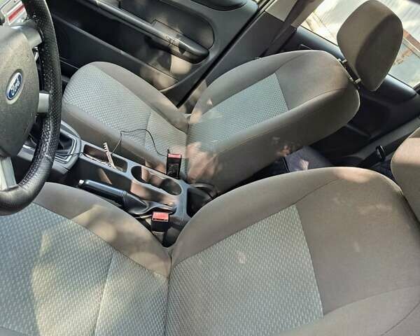 Синий Форд Фокус, объемом двигателя 1.6 л и пробегом 305 тыс. км за 4500 $, фото 2 на Automoto.ua