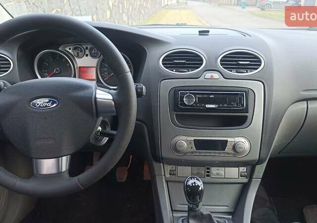 Синий Форд Фокус, объемом двигателя 1.6 л и пробегом 221 тыс. км за 4800 $, фото 12 на Automoto.ua