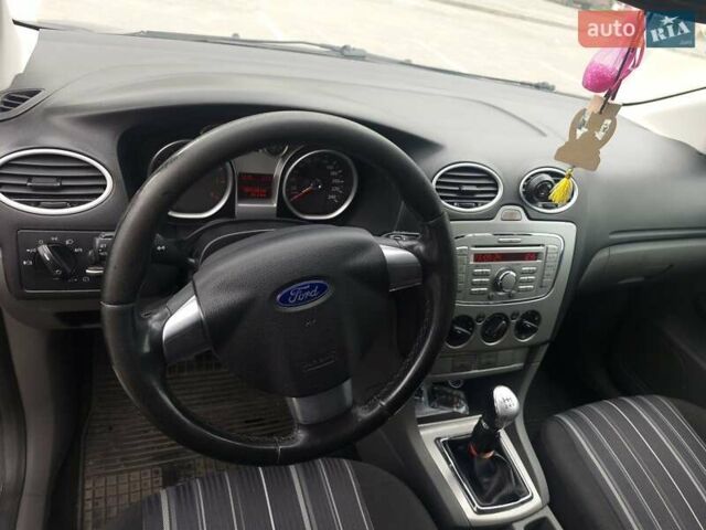 Синій Форд Фокус, об'ємом двигуна 1.6 л та пробігом 307 тис. км за 4700 $, фото 26 на Automoto.ua