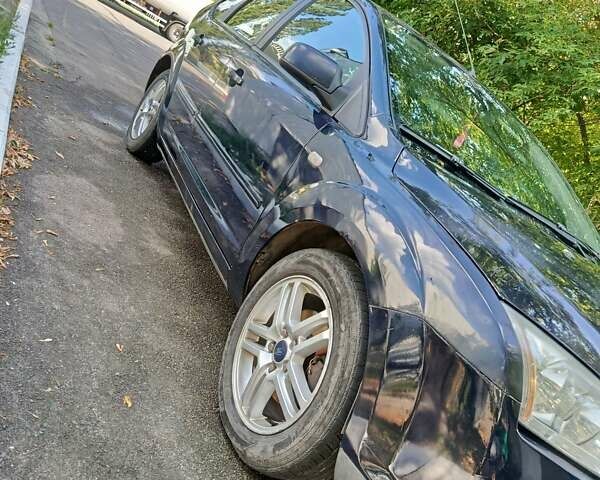 Синий Форд Фокус, объемом двигателя 1.6 л и пробегом 305 тыс. км за 4500 $, фото 12 на Automoto.ua