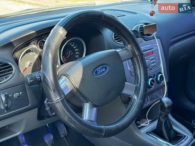 Синій Форд Фокус, об'ємом двигуна 1.4 л та пробігом 185 тис. км за 5190 $, фото 12 на Automoto.ua