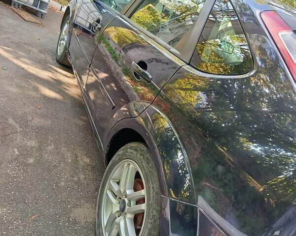 Синий Форд Фокус, объемом двигателя 1.6 л и пробегом 305 тыс. км за 4500 $, фото 6 на Automoto.ua