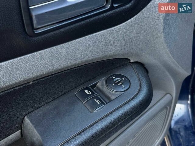 Синій Форд Фокус, об'ємом двигуна 1.4 л та пробігом 185 тис. км за 5190 $, фото 13 на Automoto.ua