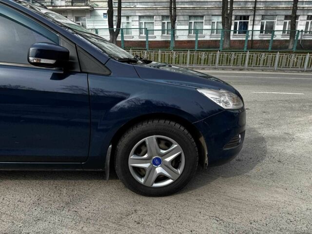 Синий Форд Фокус, объемом двигателя 1.4 л и пробегом 185 тыс. км за 4990 $, фото 4 на Automoto.ua