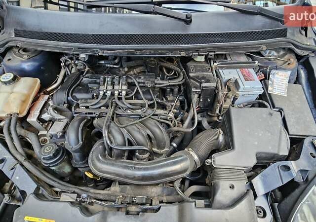 Синий Форд Фокус, объемом двигателя 1.6 л и пробегом 264 тыс. км за 4800 $, фото 14 на Automoto.ua