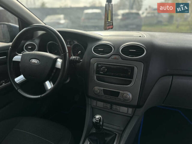 Синий Форд Фокус, объемом двигателя 1.8 л и пробегом 228 тыс. км за 6000 $, фото 49 на Automoto.ua