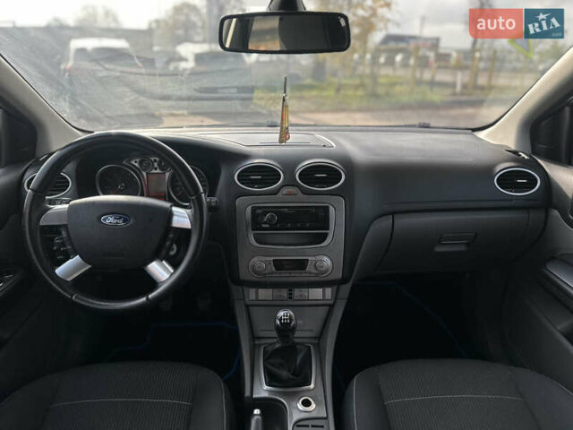 Синий Форд Фокус, объемом двигателя 1.8 л и пробегом 228 тыс. км за 6000 $, фото 52 на Automoto.ua