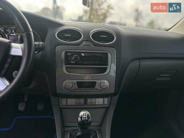 Синий Форд Фокус, объемом двигателя 1.8 л и пробегом 228 тыс. км за 6000 $, фото 33 на Automoto.ua