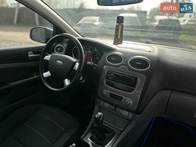 Синий Форд Фокус, объемом двигателя 1.8 л и пробегом 228 тыс. км за 6000 $, фото 50 на Automoto.ua